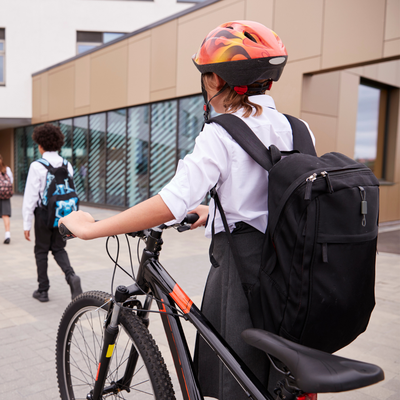 Child with bike and helmet